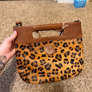STS Ranchwear leopard flat rock clutch